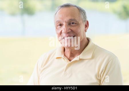 Senior man smiling, portrait. Stock Photo