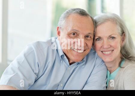 Portrait of senior couple smiling towards camera. Stock Photo
