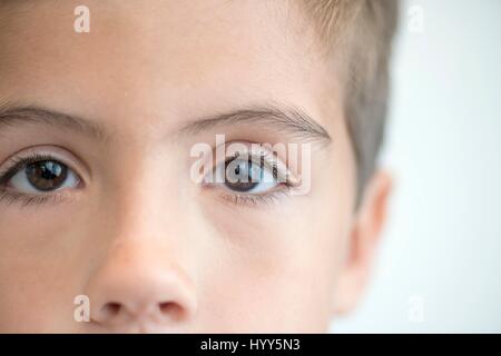 Boy with brown eyes, close up portrait. Stock Photo