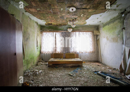 UNNERVING images show how a green carpet of mould is taking over the walls and ceilings of what was once a grand hotel.Other disturbing  and rarely seen pictures show the gruesome state of the hotel building, with most of its walls and ceilings entirely covered in the green mould, rubble scattered on every floor and an empty indoor swimming pool vandalised with graffiti. Captured in Germany by urban explorer Katuszynski Alexandre (46), on a reflex Canon with a basic tripod, these spine-chilling photographs present a once lively hotel that has moulded and died with age. Katuszynski Alexandre /  Stock Photo