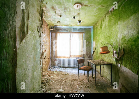 UNNERVING images show how a green carpet of mould is taking over the walls and ceilings of what was once a grand hotel.Other disturbing  and rarely seen pictures show the gruesome state of the hotel building, with most of its walls and ceilings entirely covered in the green mould, rubble scattered on every floor and an empty indoor swimming pool vandalised with graffiti. Captured in Germany by urban explorer Katuszynski Alexandre (46), on a reflex Canon with a basic tripod, these spine-chilling photographs present a once lively hotel that has moulded and died with age. Katuszynski Alexandre /  Stock Photo