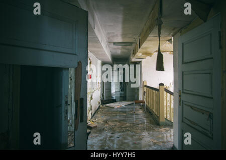 UNNERVING images show how a green carpet of mould is taking over the walls and ceilings of what was once a grand hotel.Other disturbing  and rarely seen pictures show the gruesome state of the hotel building, with most of its walls and ceilings entirely covered in the green mould, rubble scattered on every floor and an empty indoor swimming pool vandalised with graffiti. Captured in Germany by urban explorer Katuszynski Alexandre (46), on a reflex Canon with a basic tripod, these spine-chilling photographs present a once lively hotel that has moulded and died with age. Katuszynski Alexandre /  Stock Photo