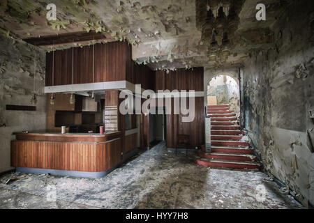 UNNERVING images show how a green carpet of mould is taking over the walls and ceilings of what was once a grand hotel.Other disturbing  and rarely seen pictures show the gruesome state of the hotel building, with most of its walls and ceilings entirely covered in the green mould, rubble scattered on every floor and an empty indoor swimming pool vandalised with graffiti. Captured in Germany by urban explorer Katuszynski Alexandre (46), on a reflex Canon with a basic tripod, these spine-chilling photographs present a once lively hotel that has moulded and died with age. Katuszynski Alexandre /  Stock Photo