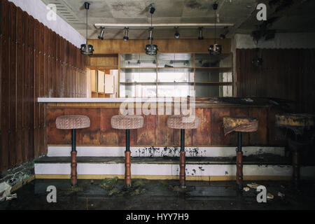 UNNERVING images show how a green carpet of mould is taking over the walls and ceilings of what was once a grand hotel.Other disturbing  and rarely seen pictures show the gruesome state of the hotel building, with most of its walls and ceilings entirely covered in the green mould, rubble scattered on every floor and an empty indoor swimming pool vandalised with graffiti. Captured in Germany by urban explorer Katuszynski Alexandre (46), on a reflex Canon with a basic tripod, these spine-chilling photographs present a once lively hotel that has moulded and died with age. Katuszynski Alexandre /  Stock Photo