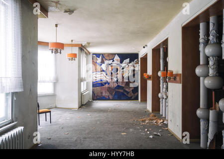 UNNERVING images show how a green carpet of mould is taking over the walls and ceilings of what was once a grand hotel.Other disturbing  and rarely seen pictures show the gruesome state of the hotel building, with most of its walls and ceilings entirely covered in the green mould, rubble scattered on every floor and an empty indoor swimming pool vandalised with graffiti. Captured in Germany by urban explorer Katuszynski Alexandre (46), on a reflex Canon with a basic tripod, these spine-chilling photographs present a once lively hotel that has moulded and died with age. Katuszynski Alexandre /  Stock Photo