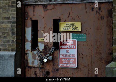 NEW JERSEY, USA: EERIE images and video have revealed the crumbling remains of an abandoned isolation hospital where children were allegedly abused and was the set for the hit Russel Crow movie A Beautiful Mind. The spooky pictures and footage show the contrasting conditions in the left wing and right wing of the old hospital building. The left wing, abandoned since the 1970s, is a flaking, dilapidated mess while the right wing, abandoned in more recent years, looks like it could still be active. Other haunting shots show the rusty padlocked doors, biohazard bags left behind and medical equipm Stock Photo