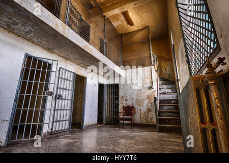CANADA: HAUNTING images have revealed the decaying remains of a 152-year-old Canadian prison that was built in 1865 to house notorious criminals. The eerie snaps show paint flaking from the walls and rust ridden cell doors that have been left flung open. Other shots show a dirty room with toilet facilities and graffiti carved into door frames. Another image shows light spraying through a cell onto the cracked stone floor. The spectacular snaps were taken at Winter Prison in Sherbrooke by photographer Keven Lavoie (34) from Montreal, Quebec, Canada. To take the pictures, Keven used a Canon 6D c Stock Photo