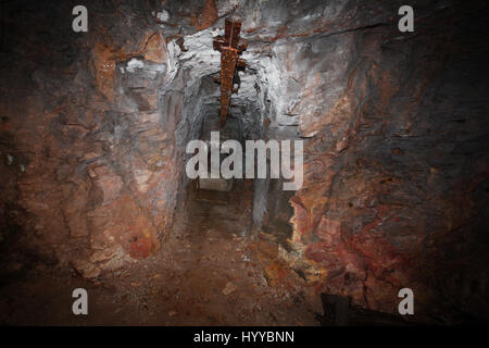 CALLINGTON, CORNWALL, UK: An adit. EERIE images reveal the Cornish mining tunnel that was once used to test explosives and research the potential impact of nuclear tests during the Cold War under the code name Operation Orpheus. The haunting pictures show inside the 2,180-foot tunnel where rusting sleepers and collapsing structures remain. Other shots, look down into an adit (entrance) and show the unsuspecting exterior of the mine where a metal gate has been closed across. The spectacular images were taken at the Excelsior Tunnel, Kit Hill, Callington, Cornwall by editor, Nat W (46) from Lond Stock Photo