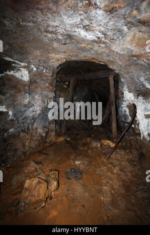 CALLINGTON, CORNWALL, UK: EERIE images reveal the Cornish mining tunnel that was once used to test explosives and research the potential impact of nuclear tests during the Cold War under the code name Operation Orpheus. The haunting pictures show inside the 2,180-foot tunnel where rusting sleepers and collapsing structures remain. Other shots, look down into an adit (entrance) and show the unsuspecting exterior of the mine where a metal gate has been closed across. The spectacular images were taken at the Excelsior Tunnel, Kit Hill, Callington, Cornwall by editor, Nat W (46) from London. To ta Stock Photo