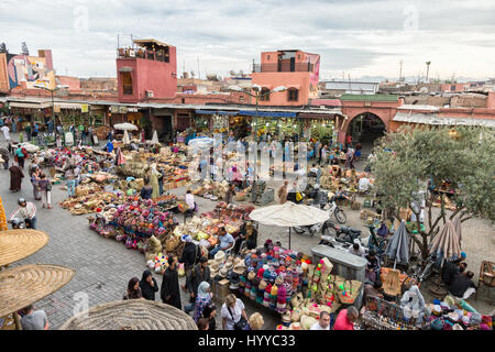 MARRAKECH, MOROCCO - APR 28, 2016: Tourist visiting a berber market in the souks of Marrakesh. Stock Photo