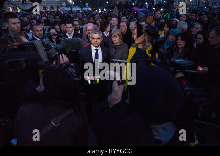 London, UK. 23rd March, 2017. Sadiq Khan, Mayor of London, is interviewed following a vigil in Trafalgar Square for the victims of the terror attack o Stock Photo