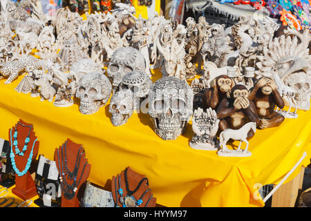 Mexican souvenirs close up. Scull figure, monkey... Stock Photo