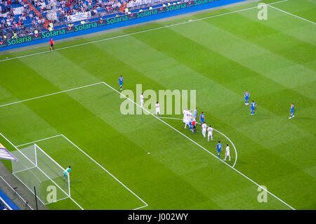 Real Madrid versus Getafe football match. Free kick. Santiago Bernabeu stadium, Madrid, Spain. Stock Photo