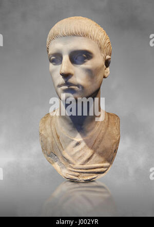 Roman portrait bust of a young man with the hairstyle from the rule of Trajan 98-117 AD. National Roman Museum, Rome, Italy Stock Photo