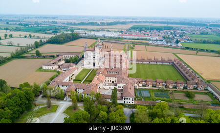 Aerial view of the Certosa di Pavia, built in the late fourteenth century, courts and the cloister of the monastery and shrine in the province of Pavi Stock Photo