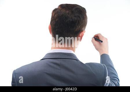 Man writing on white board view from back isolated Stock Photo