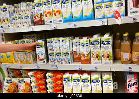 Shelves with Lactose-free Milk substitutes in a supermarket Stock Photo