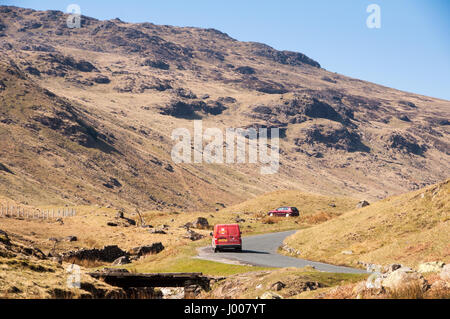 Keswick, England - April 20, 2009: A Royal Mail post van clmns the narrow mountain pass at Honister in the English Lake District. Stock Photo