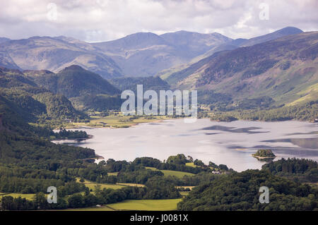 The mountains of the English Lake District rise above Derwent Water lake and Borrowdale valley as seen from Latrigg hill. Stock Photo