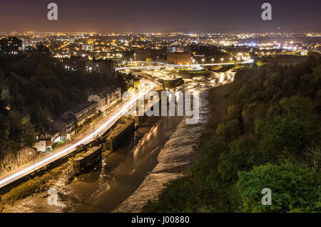 Trails of lights on Bristol's Portway road beside the Floating Harbour Brunel Locks. Stock Photo