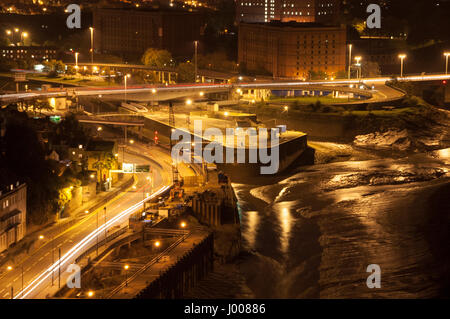 Trails of lights on Bristol's Portway road beside the Floating Harbour Brunel Locks. Stock Photo