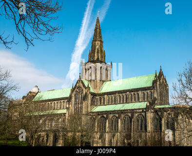 A view of Church of Scotland's Glasgow Cathedral in the city centre on a bright sunny day with blue sky and dramatic white cloud streaks Stock Photo