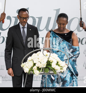 Kigali. 8th Apr, 2017. Rwandan President Paul Kagame and First Lady Jeannette Kagame lay a wreath at the genocide victim's mass graves in Kigali, Rwanda, on April 7, 2017. Lighting the flame of hope and laying the wreath at the Kigali Genocide Memorial Centre marked the start of the 23rd commemoration of the 1994 genocide in which more than one million people in Rwanda, mainly Tutsi and moderate Hutus, were killed. Credit: Xinhua/Alamy Live News Stock Photo