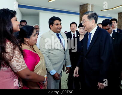 Colombo, Sri Lanka. 8th Apr, 2017. Yu Zhengsheng, chairman of the National Committee of the Chinese People's Political Consultative Conference (CPPCC), meets with family members of Senanayake, who signed the Rubber-Rice Pact between China and Sri Lanka 65 years ago, in Colombo, Sri Lanka, April 8, 2017. Yu visited the island country from Thursday to Saturday at the invitation of Sri Lankan Parliament Speaker Karu Jayasuriya. Credit: Ju Peng/Xinhua/Alamy Live News Stock Photo