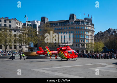 London's Air Ambulance lands at Trafalgar Square in response to a nearby accident, London England United Kingdom UK Stock Photo