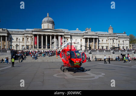 London's Air Ambulance lands at Trafalgar Square in response to a nearby accident, London England United Kingdom UK Stock Photo