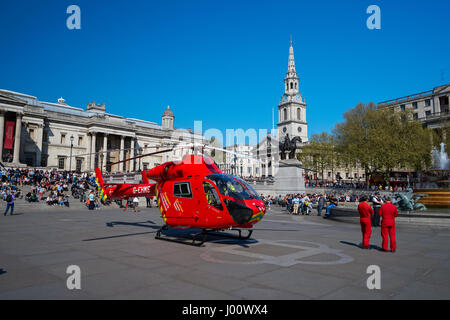 London's Air Ambulance lands at Trafalgar Square in response to a nearby accident, London England United Kingdom UK Stock Photo