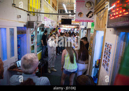 London, UK. 8th April, 2017. Latin American singers provide entertainment in Seven Sisters Market following an anti-gentrification protest by Save Latin Village campaigners requesting from Haringey Council the renovation rather than demolition of Latin Corner, an important community hub for London’s Latin American community. Credit: Mark Kerrison/Alamy Live News Stock Photo