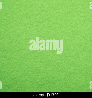 Abstract bright green felt cloth as background and square Stock Photo