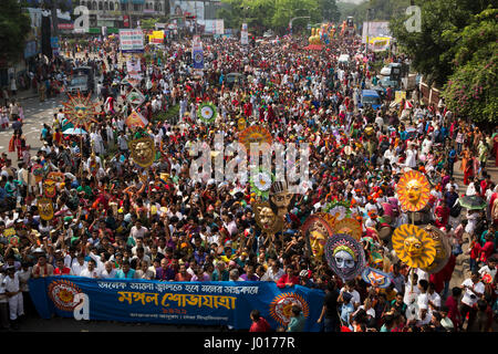 Mangal Shobhajatra, a colourful and festive procession celebrating Pahela Baishakh, the Bengali New Year, sets off from the Fine Arts Faculty of Dhaka Stock Photo