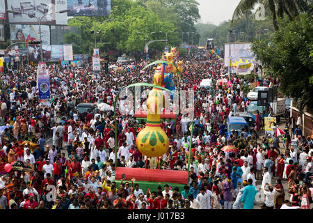 Mangal Shobhajatra, a colourful and festive procession celebrating Pahela Baishakh, the Bengali New Year, sets off from the Fine Arts Faculty of Dhaka Stock Photo