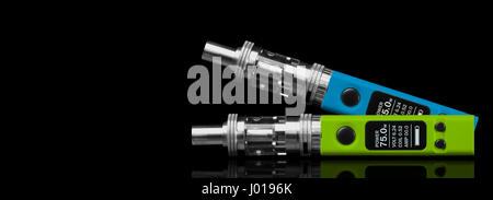 Two electronic cigarettes - isolated on black background. Stock Photo