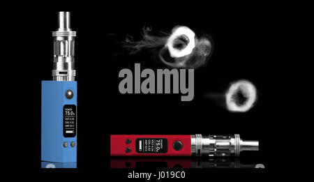 Two electronic cigarettes and smoke rings - isolated on black background. Stock Photo