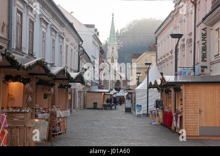 Picture of Christmas fair in Celje, Slovenia. Old and beautiful city has a long tradition of Christmas markets, and fairy land awaits kids in winter. Stock Photo