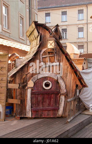 Amazing wooden house from fairy tales. Beautiful decoration as part of fairy-land amusing park in Celje Slovenia. For kids during the Christmas time. Stock Photo