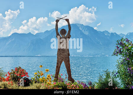 Montreux, Switzerland - August 27, 2016: Figure of man at Geneva Lake in Montreux, Vaud canton, Switzerland Stock Photo