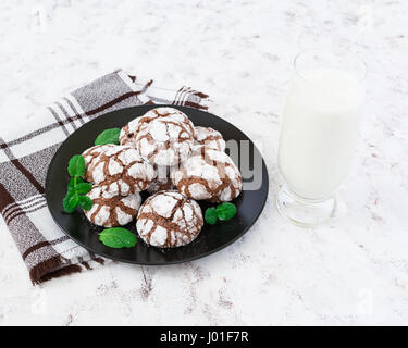 Chocolate cookies and a glass of milk on white background Stock Photo