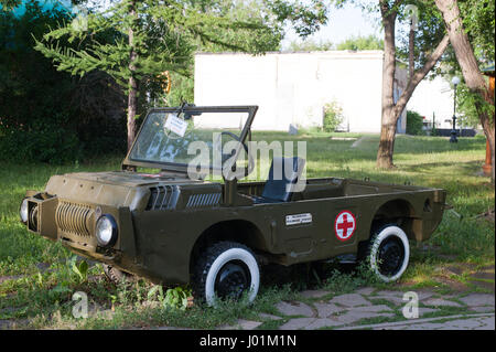 Orenburg, Russia-June 23,2016, Amphibious vehicle LuAZ-967 in the military ambulance version in Memorial complex “Salute, Pobeda!” open-air museum loc Stock Photo