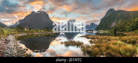 Mitre Peak reflecting in the water, sunset, Milford Sound, Fiordland National Park, Te Anau, Southland Region, Southland Stock Photo