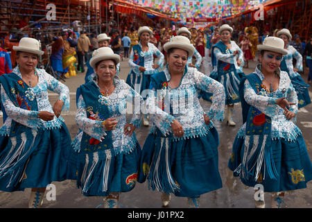 Morenada Dance Group In Colourful Outfits Parading Through The Mining ...