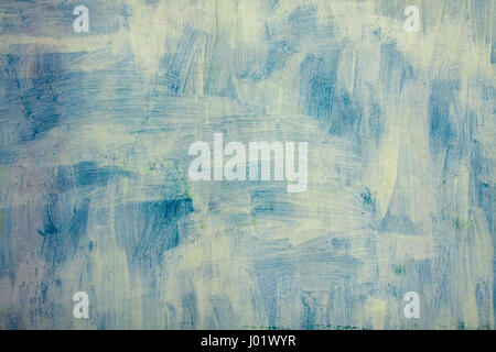 white brush painted on old green cement wall Stock Photo