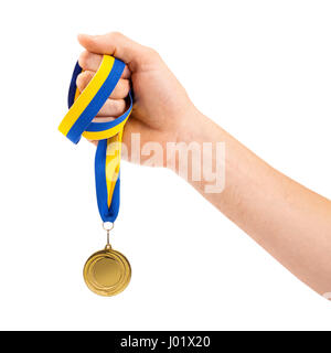 gold medal in hand on white background Stock Photo