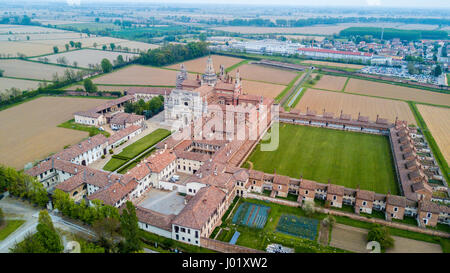 Aerial view of the Certosa di Pavia, built in the late fourteenth century, courts and the cloister of the monastery and shrine in the province of Pavi Stock Photo