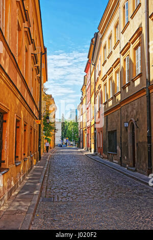 One of the main Streets in Warsaw city center, Poland. People on the background Stock Photo