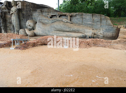 The monolithic reclining Buddha statue, the Gal Viharaya at the ancient kingdom capitol of Polonnaruwa (Sri Lanka) Stock Photo