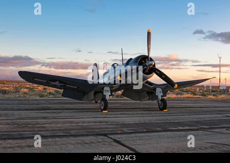 Airplane WWII F-4U Corsair vintage fighter aircraft at air show runway Stock Photo